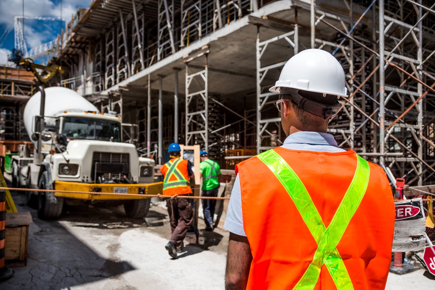 Construction site with workers and heavy equipment